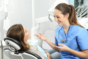 Patient talking to a dentist